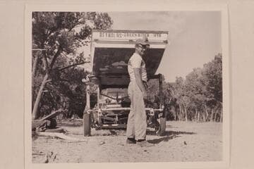 Lug Larsen preparing to unload the "Galloway" at Carrs Landing. Browns Hole