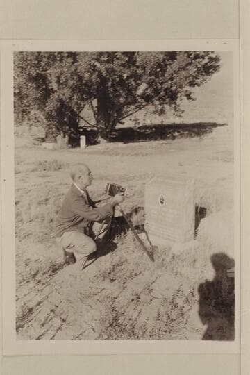 Photographing the portrait of Dubendorff on his headstone