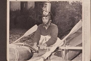 Leslie Jones. At the oars of his boat "Honey, The Rapids Queen."