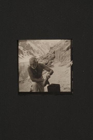 Masland bathes the dishes at Diamond Creek