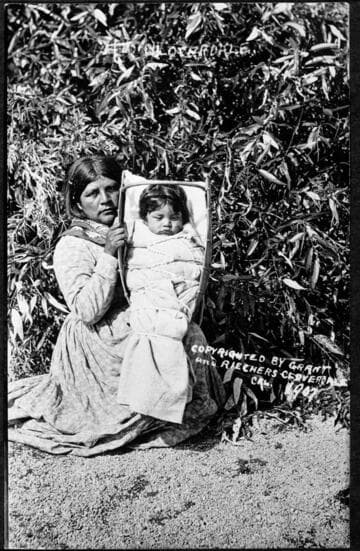 Pomo woman and baby in basket, Cloverdale, California, 1907