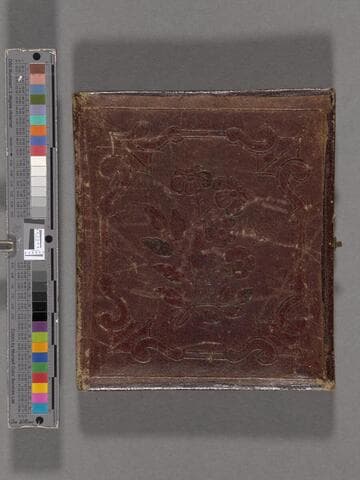 Maria de Jesus ("Sue") Wilson as a young girl about 5 or 6 years old, wearing a necklace with a cross