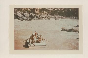 Nevills working one of his sadirons into the eddy below Vulcan Rapid after lining. Joe Desloge and Margaret Marston on the stern