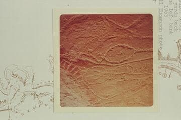 Pictographs in small cave below the mouth of Chandler Creek and 50 yards back from the left bank; Mile 47