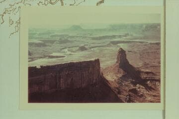 Southwest down Stillwater Canyon from Candlestick Tower. The Turks Head is left of center. Deadhorse Canyon is right of center. Back of the un-named butte at upper left is Elaterite Butte
