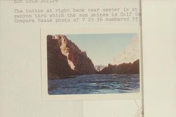 Upstream from below Rapid No. 23. The button at right bank near center is at Mile 203. The side canyon thru which the sun shines is Calf Canyon at Mile 202.75. Compare Rezak photo of 7 25 56 numbered 55