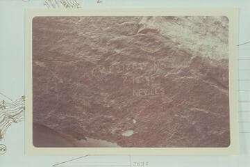 Nevills inscription at head of Rapid 23 in The Big Drop