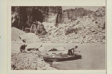 Southwest Explorations crew in Cataract Canyon. Mile 202 1/2. Left is William R. Dickinson, Santa Barbara. Right: Jon Morrow Lindbergh, Darien, Connecticut. From a print owned by Kent Ross
