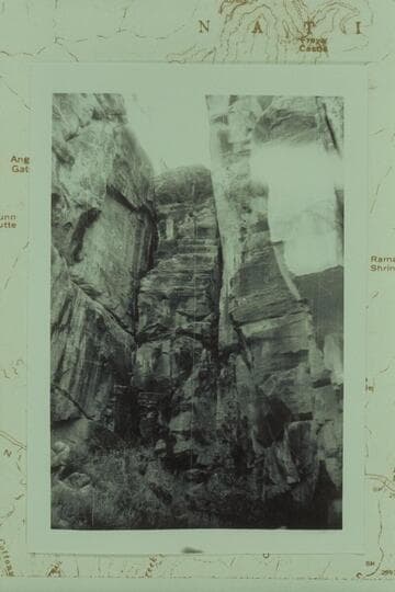 Rope descent at lower end of central ravine 1 1/4 miles north of Cape Royal on route to Wotans Throne. South side of promontory