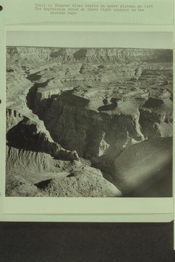 Vaughn Spring and source of Deer Creek. Trail to Thunder River starts on upper plateau at left. The depression shown at lower right appears on the contour maps