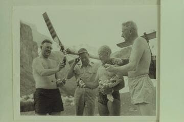 Red Carson arrived at Hance Rapids by helicopter bringing some light refreshment. Left to right: Ed Hudson, Carson, Marston and Desloge