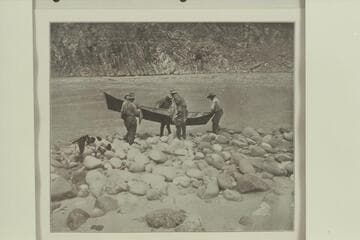 Launching the 14-foot Canvas Boat. The boat was owned and operated by Kolb