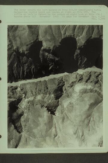 The river enters the left margin at Mile 106.05 immediately below Serpentine Canyon Rapid and leaves at right at Mile 107. The riffle at left is formed by the canyon at right bank at Mile 106.1