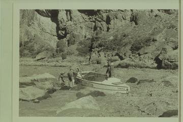 Lining Lava Falls. P. T. Reilly; Norm Nevills; Jim Riggs, Jr