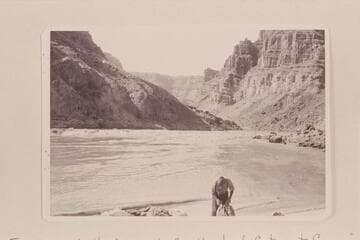 Cataract Canyon--William J. Davis. Print sent by Davis in 1952 with caption: "The landing after the upset. Between two bad rapids named #22 and #23 by Eddy"