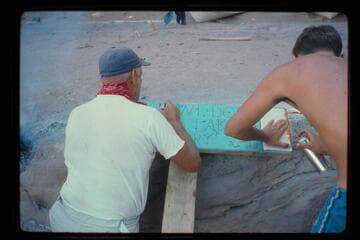 Ed I'Anson and Buzz Belknap make sign; Nankoweap
