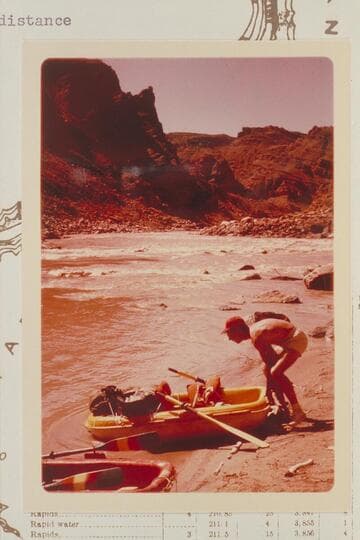 Jorgen Visbak launches his Yak at head of Rapid #7, Mile 209.6 RB. Y and Cross Canyons in the distance