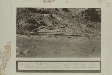 Rapid #3 showing freight boat of the U. S. Geological Survey party, 5.0 miles below the Green River. Rapid #3 heads at Mile 211.65 and drops 4' in .15 miles