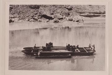 Barge used in diamond drilling the river bed at the lower Marble Canyon damsite, near Mile 40 in Marble Canyon. Copied from print in collection of Rod Sanderson