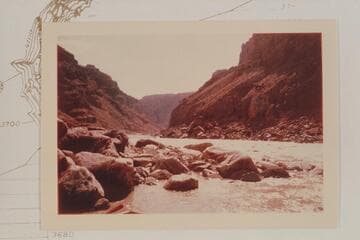 Down river at Rapid No. 19. Nims photo 79 was made from a short distance up river and higher on the talus. Rapid No. 19 heads at Mile 203.7 and drops 6 ft. in .2 miles