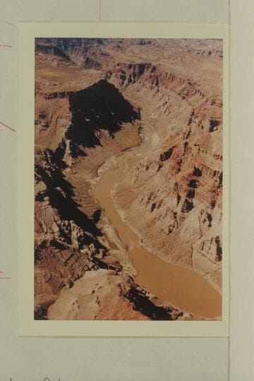 Down river from over the left bank at Mile 212. Rapid #3 is near the bottom of the print at Mile 211.7. Rapid #4 is below the island where the canyon turns right. Rapid #5 is beyond where the canyon swings to the left again