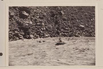 Boat dropping off far right tongue of Hance Rapid. At this stage there is a midstream course as well as one just to left of the run made by the boat in the photo