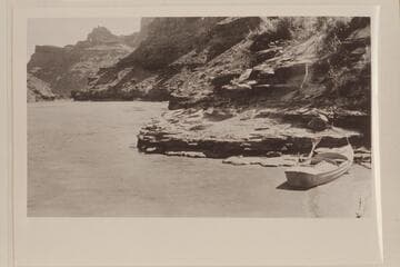 Looking down Green River to its junction with the Colorado. Camp at the right, one mile above the mouth of Green River