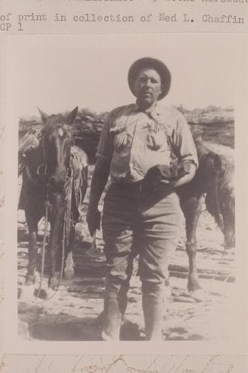Harald W. C. Prommel on De Chelly Sandstone--oil saturated--near mouth of South Hatchie Canon. Nequoia Arch Reconnaissance; 3 weeks horseback