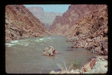 Down at 232 Mile Rapid at Mile 232 1/2 Requiem Rapid. Estimated flow: 28,000 cfs