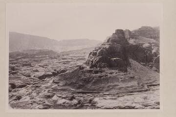 Butte 5070 at north end of eastern branch of Cummings Mesa. The slope of Navajo Mountain is upper left