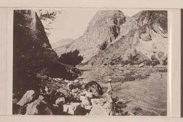 Looking downstream from head of Lava Falls. Koms with straw hat. Moore with white cap. Photo from Lint album