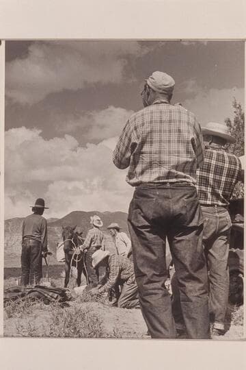 Preparing the packs for the drop into Navajo Canyon. Buck Whitehat; Nancy Daly; F. E. Masland; Tom Daly; Jorgen Visbak; Bill Belknap