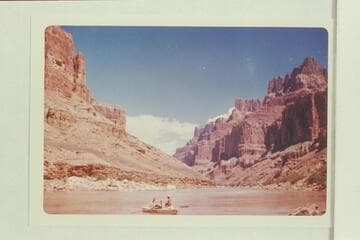 Up from mouth of the Little Colorado River. The "Joan" is in the foreground with Garth Marston at the oars. Dock Marston sits forward