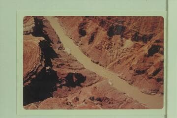 Down river from foot of 24.5 Mile Rapid to 25 Mile Rapid and the fan at Mile 25.2