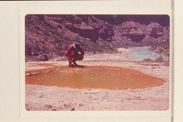 Spring in the Sipapu in the Little Colorado River. Colin Fletcher is in the picture