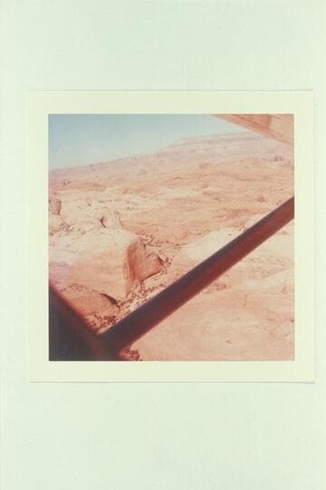 Down Lehi Fork of Anasazi Canyon from near the Base Camp of 1959. Spencer Point of 50 Mile Mountain is upper center. The talus of 60 Mile Point is just under the wing at upper right