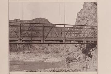 Margaret Marston at Suspension Bridge. Nevills boats in background