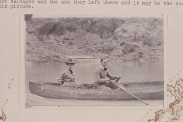 Ellsworth Kolb at the oars of Dave Rust's folding boat at the mouth of Bright Angel Creek. Marie is trying to remain calm while participating in Ellsworth's first boating experience