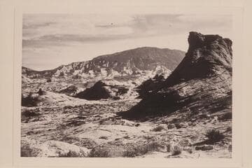 Formation at rim of plateau southwest of Nasja Creek, Navajo Mountain. The sloping mesa at center is 4903 between Bald Rock Creek and Nasja Creek