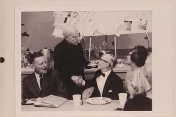 Howard Stricklin and Edith Kolb Lehnert are amused at the greeting and congratulations to Emery Kolb by Dock Marston. Emery's birthday party. Grand Canyon