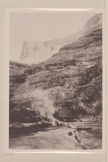 Camp in San Juan Canyon near mouth of Johns Canyon. Lower part of wall formed by Goodridge formation and upper part by Moonlight sandstone and Hermit Shale. Johns Canyon--Mile 82.3