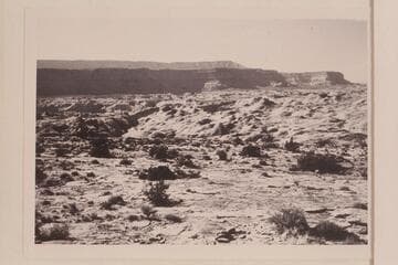 Fifty Mile Mountain. Sixty Mile Point. Drainage to Music Temple left of center. From plateau west of Nasja Creek at overlook to San Juan River