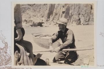 Bus Hatch and one of the skiffs below Monument Creek Rapid during noon stop of 1934, July 27. Bright Angel gauge: 2,070 cfs