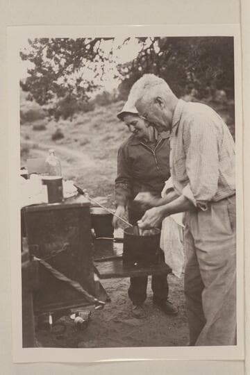 Fern Frost and Joe Desloge bathe the dishes at Junction Camp on Jeep Trip to the Needles