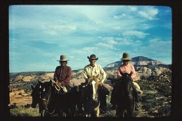 Whitehat, Bahe, and Sid Whiskers on Rainbow Bridge Trail; Navajo Begay in background