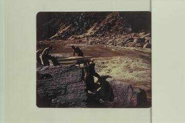 Portage of MHE sadiron at Hermit Rapid; Bill Thompson, Frank Wright, Willard Wright, John Harper and Duane Bishop