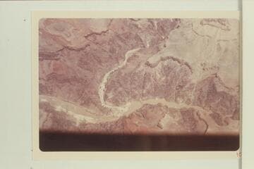 Bright Angel Creek at its mouth with Phantom Ranch at the left bank about a half mile from the Colorado River. The suspension bridge is above the mouth. The scouring from the flood of 1966, Dec., shows plainly