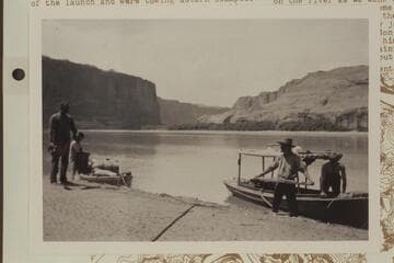 The 18-ft. launch and the skiff "W. H. Bradley" at shore after the swamping of the Stanton skiff on Aug. 21, 1910, about 10 miles up from Wright Bar. From negative in Waller collection