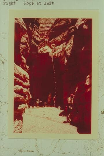 40 ft. tall 1/4 mile from mouth of Tuckup Canyon. Water stream at right; rope at left