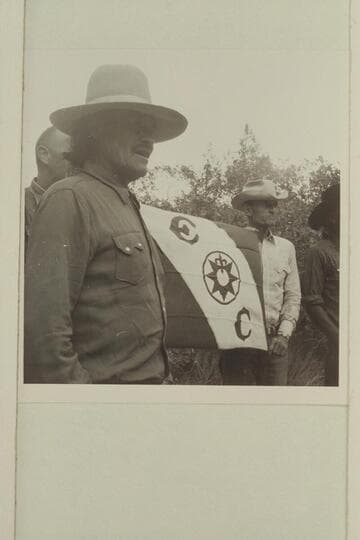 The official stamp of an exploration. Middle fork of 73.6. Buck Whitehat and Tom Daly hold the flag